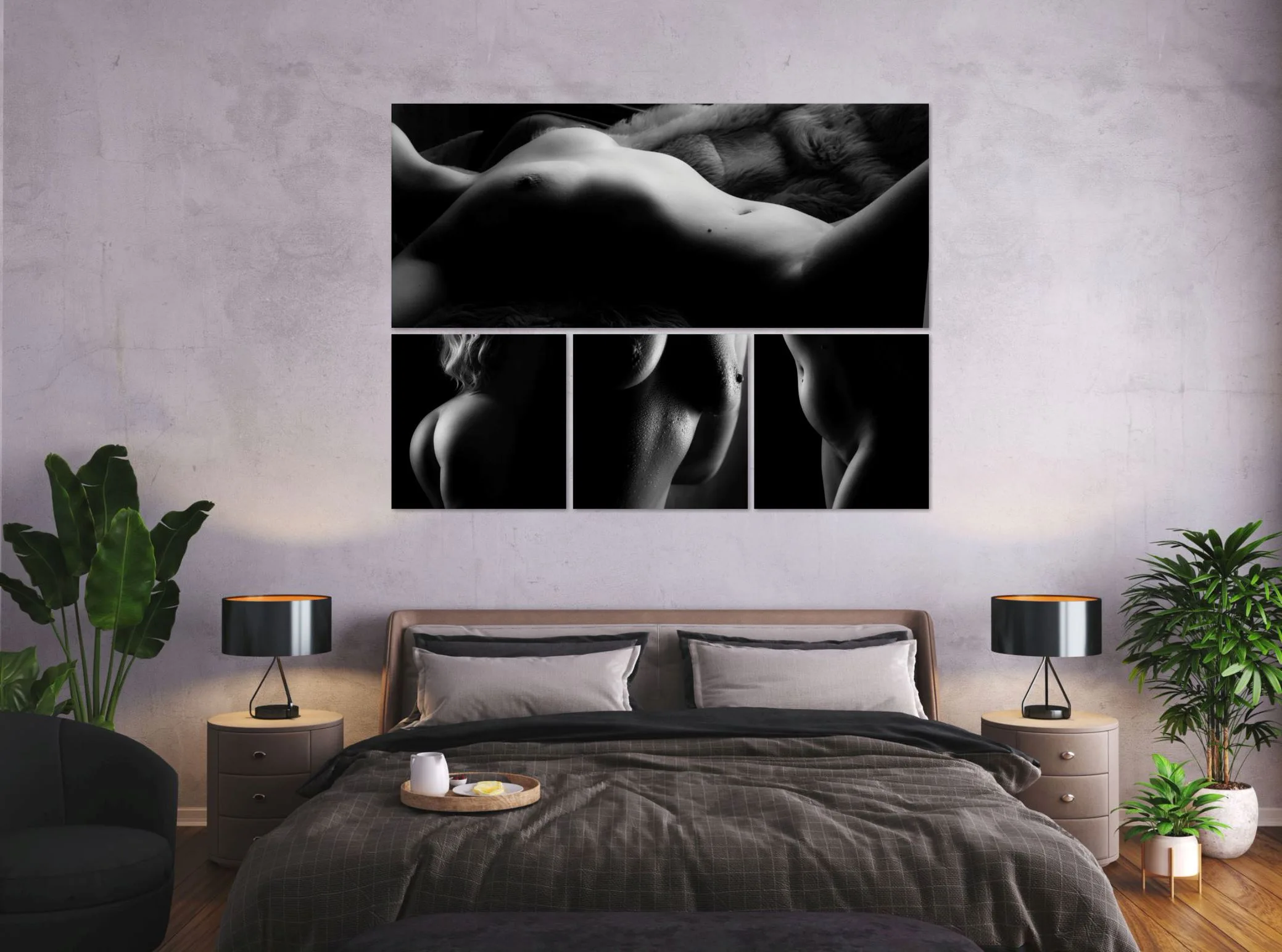 A black and white wall collection of boudoir portraits above a bed in a grey bedroom