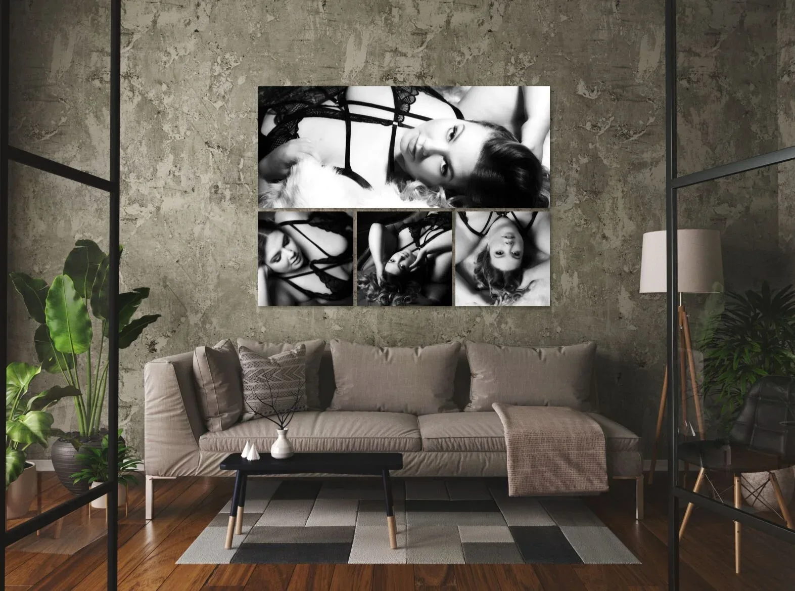 A black and white wall collection above a sofa in a room with grey textured walls