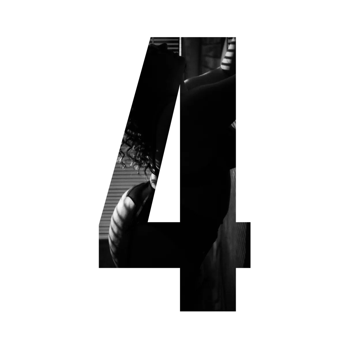 A bridal boudoir photograph cut into the shape of the number four