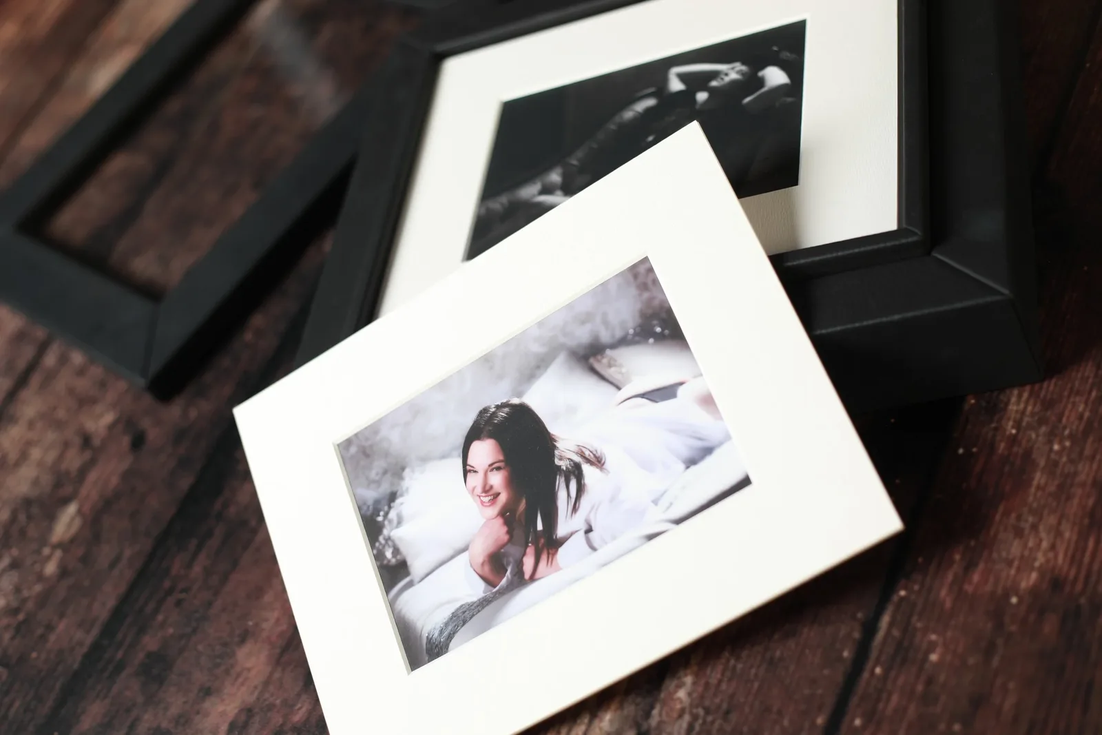 A box of mounted Divine Divas prints