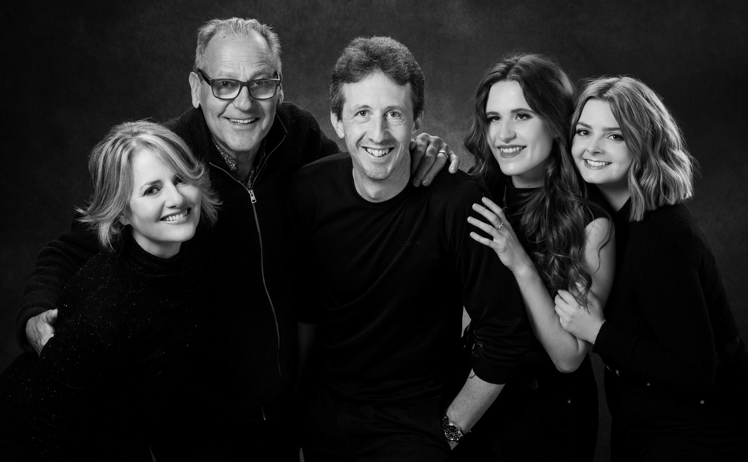 The Divine Divas team together, smiling and laughing